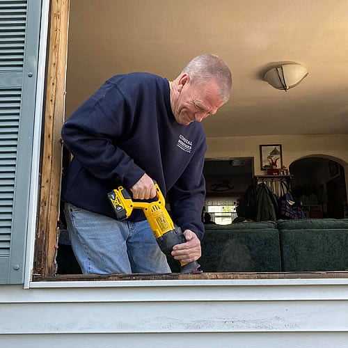 Coastal-Industries, Inc. | Jesse installing a new window